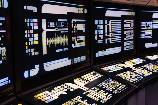 High-tech command center with advanced digital displays and control panels. Customer data platforms for small UK businesses: a shortlist with VAT, hosting and support checks