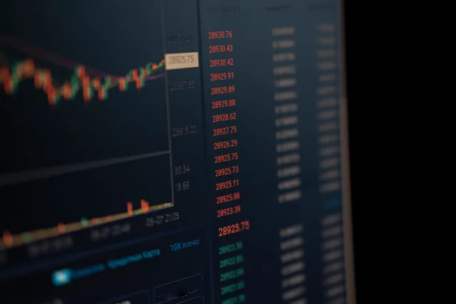 Close-up of a computer screen showing dynamic financial market data and charts, indicating real-time trading updates. Attribution methods for customer data platforms and when to withhold causal claims